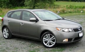 2011 Kia Forte SX hatchback -- 06-23-2011 front.jpg