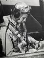 George H.W. Bush seated in a Grumman TBM Avenger, circa 1944 (H069-13).jpg