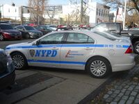 Один из автомобилей полиции Ford Fusion прошлого поколения, 2008 год выпуска.