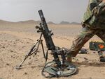 An Afghan National Army commando with the 1st Tolai, 3rd Special Operations Kandak fires a mortar round during a training exercise in the Dand district, Kandahar province, Afghanistan, May 25, 2013 130525-A-QS703-119 (cropped 2).jpg