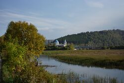 Church and the dam of the minyar pond.jpg