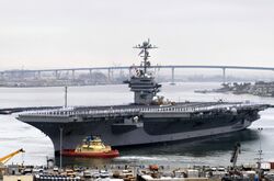 US Navy 080821-N-4163T-001 The crew of the aircraft carrier USS George Washington (CVN 73) mans the rails as the ship departs Naval Air Station North Island.jpg