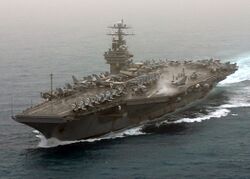 US Navy 030320-N-0275F-501 USS Theodore Roosevelt (CVN 71) currently deployed, powers through the Mediterranean Sea.jpg