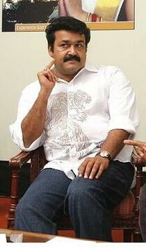 Mohanlal with the team.jpg
