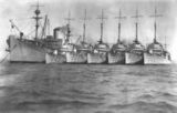 USS Whitney (AD-4) at anchor with USS Stewart (DD-224), USS Pope (DD-225), USS Pillsbury (DD-227), USS John D. Ford (DD-228), USS Truxtun (DD-229) and USS Peary (DD-226), in the 1930s.jpg