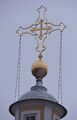 Крест, венчающий колокольню собора