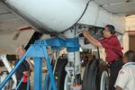 Mechanics work on Super Guppy Turbine's main landing gear (120503-F-JJ999-020).jpg