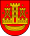 A coat of arms depicting a golden castle with three turrets surrounded with four golden stars all on a red background