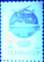 The Soviet Union 1991 CPA 6299 stamp under 365nm UV (14th standard issue of Soviet Union. 3rd issue. Modern Mail Transport. Mail truck, train, ocean liner, Ilyushin Il-86 jetliner and Mil Mi-2 helicopter).jpg