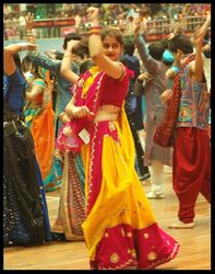 A dance and music celebration at Navaratri festival.jpg