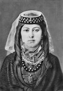 Молодая грузинка в традиционном головном уборе. 1881 г.