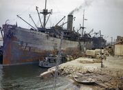 Allied Ships Unloading Supplies at Sfax, Tunisia For the Allied Forces in the Western Desert, Spring 1943 TR1029.jpg
