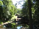 Lomonosov. Russia. Palace and Park Ensemble "Oranienbaum". Karasta river and the bridge-dam at the Lower pond..JPG