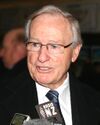 Jim Bolger at press conference retouched.jpg