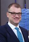 Tallinn Digital Summit. Handshake Juha Sipilä (2017).jpg