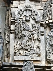 12th-century Belur Vaishnavism Hindu temples complex, Vishnu avatar Varaha saving Bhudevi (goddess earth) and crushing evil demon.jpg