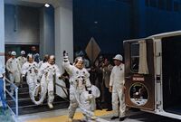 Apollo 11 crew at van for transfer to launch pad.jpg