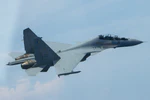 Royal Malaysian Air Force Sukhoi Su-30MKM over the South China Sea in May 2015.JPG