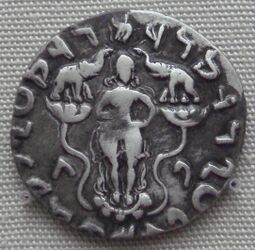 Coin of Azilises showing Gaja Lakshmi standing on a lotus 1st century BCE.jpg