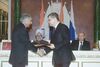 The Indian Ambassador to Russia Mr. Kanwal Sibal exchanging the signed document on Intellectual Property Rights in the presence of the Prime Minister, Dr. Manmohan Singh and the President of Russia, Mr. Vladimir Putin, in Moscow.jpg