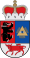 A coat of arms depicting a black bear with a silver collar on a red background on the left and a blue eye in a grey triangle on the right