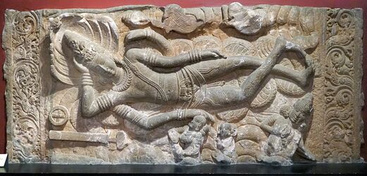 A sculpture of sleeping Vishnu Hindu deity at Museum CSMVS Mumbai.jpg