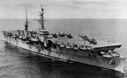 USS Saipan (CVL-48) at sea with helicopters embarked, circa in 1955 (NH 67747).jpg