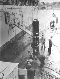 CAPTOR mine being loaded aboard sub.jpg
