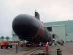 US Navy 030803-N-0000X-003 The U.S. Navy's newest and most advanced nuclear-powered attack submarine and the lead ship of its class, PCU Virginia (SSN 774) is moved outdoors for the first time.jpg