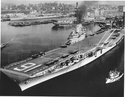 USS Lexington (CVA-16) leaving the Puget Sound Naval Shipyard, circa in September 1955.jpg