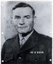 A black and white image of Charles Barrett, a white male in his Marine Corps dress uniform