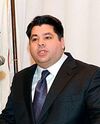 George J. Tsunis, U.S. Ambassador (cropped).jpg