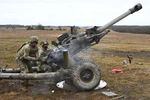 220128-A-HE359-0077 - 4-319th AFAR, 173rd AB live fire with M119 howitzers (Image 3 of 13).jpg