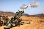 U.S. Marines with Alpha Battery, 1st Battalion, 12th Marine Regiment, 3rd Marine Division, III Marine Expeditionary Force attached to 3rd Marine Regiment, 3rd MarDiv, III MEF, fire the M777A2 155mm howitzer 130417-M-SO590-119.jpg