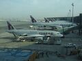 Самолёт Qatar Airways на перроне аэропорта Хамад