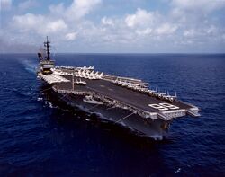 USS America (CV-66) underway in the Indian Ocean on 24 April 1983 (NH 106552-KN).jpg