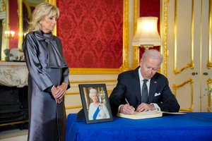 President Biden signing the official condolence book for HM Queen Elizabeth II.jpg