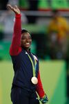 Simone Biles at the 2016 Olympics all-around gold medal podium (28262782114).jpg