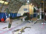 Two Agusta Bell Jet Ranger IIs in the hangar at Alexandria..jpg