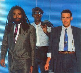 «Золотой» состав Bad Boys Blue (1984—1989). Участники (слева направо): Тревор Тэйлор, Джон МакИнерни (передний план) и Эндрю Томас (задний план)